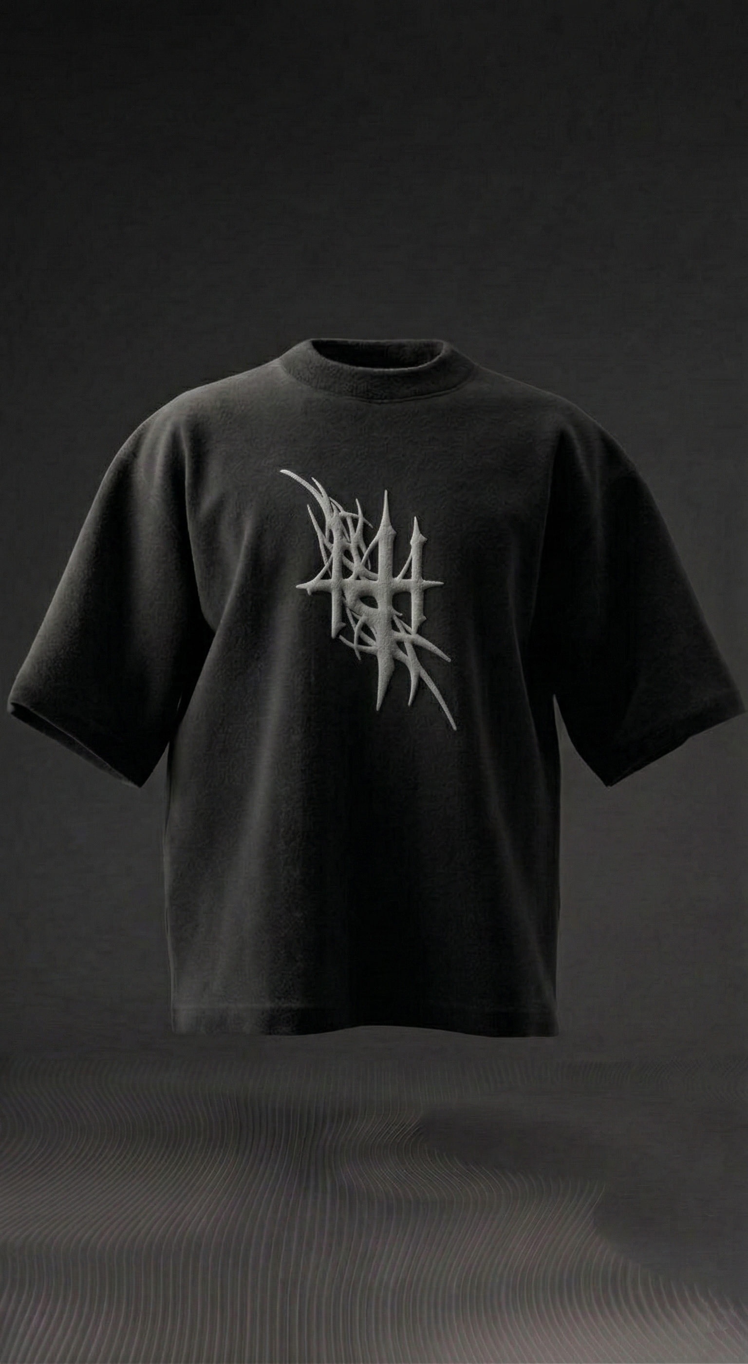 black oversized streetwear t-shirt with abstract silver graphic on chest, modern fit