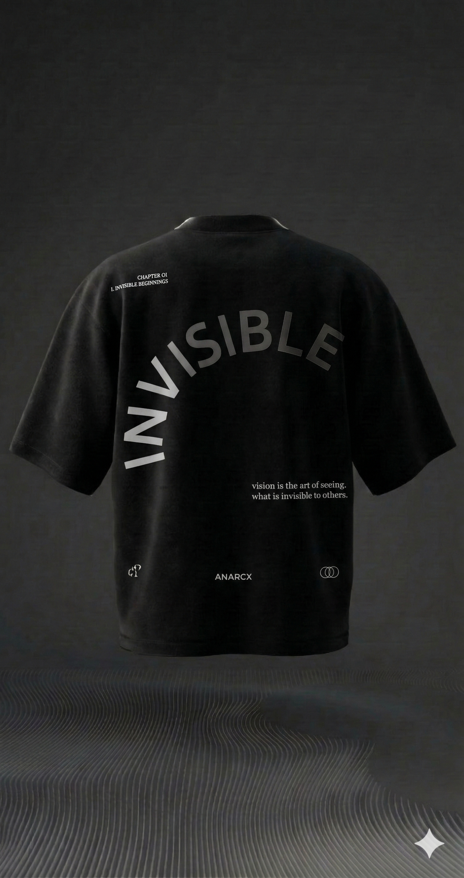 Oversized black streetwear t-shirt with 'INVISIBLE' text and graphic details on the back